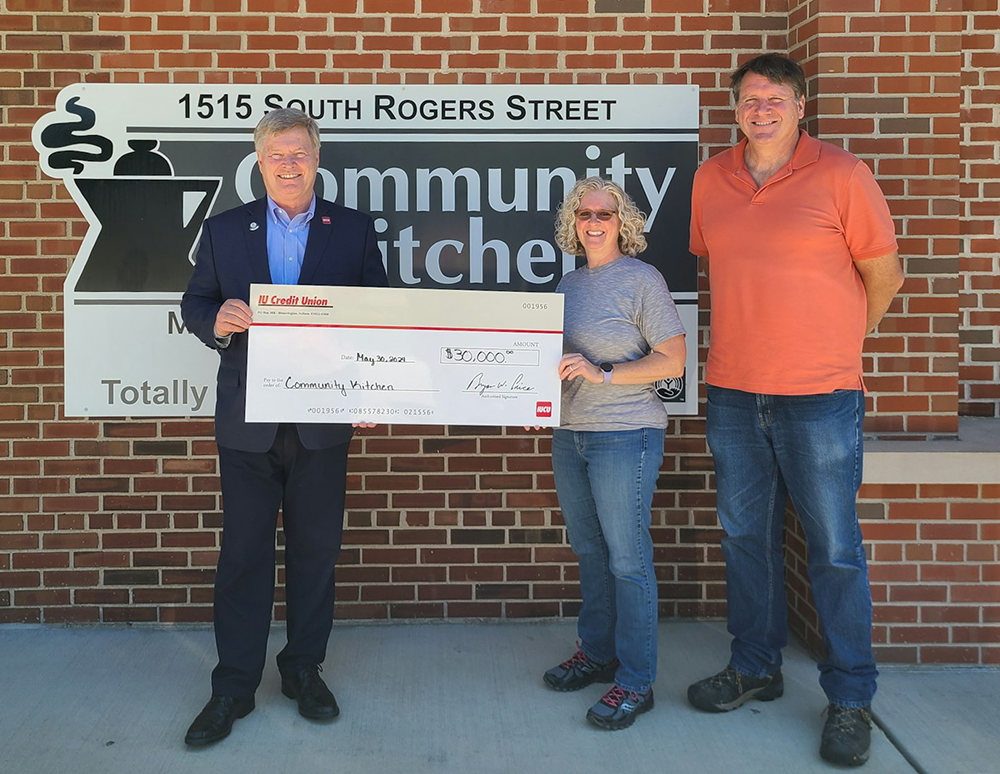 Photo of IUCU presenting $30,000 donation check to Community Kitchen